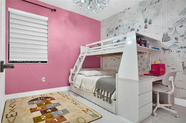 bedroom with light tile patterned floors