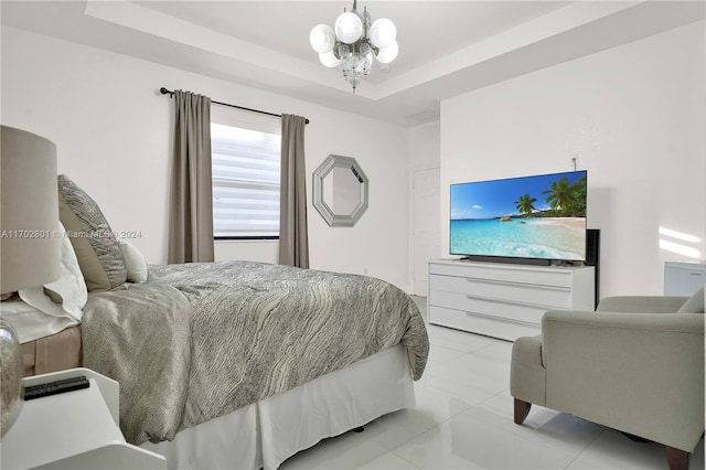 tiled bedroom featuring a raised ceiling and a notable chandelier