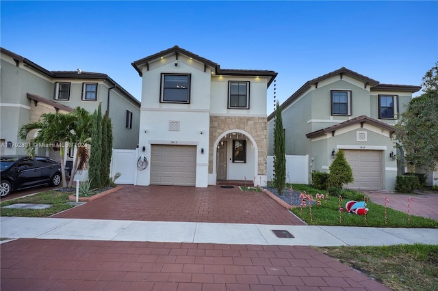 mediterranean / spanish-style house featuring a garage