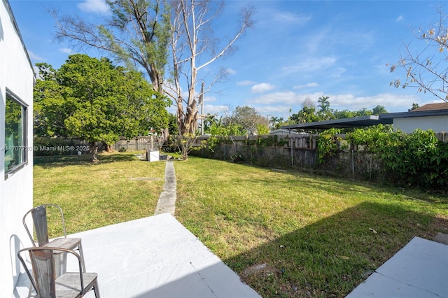 view of yard with a patio area