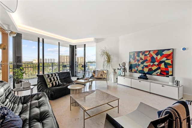 living room with floor to ceiling windows