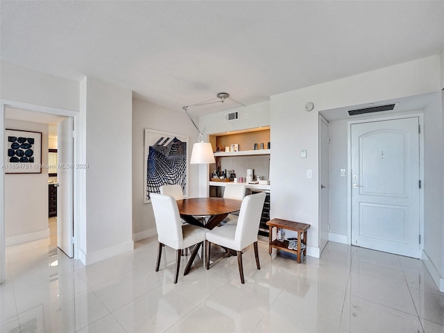 dining room featuring light tile patterned flooring