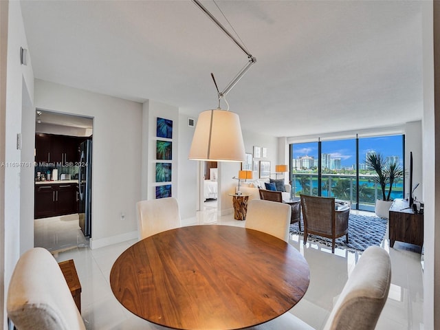 dining room with light tile patterned floors