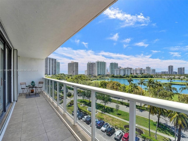 balcony featuring a water view