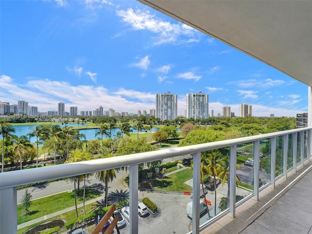 balcony featuring a water view