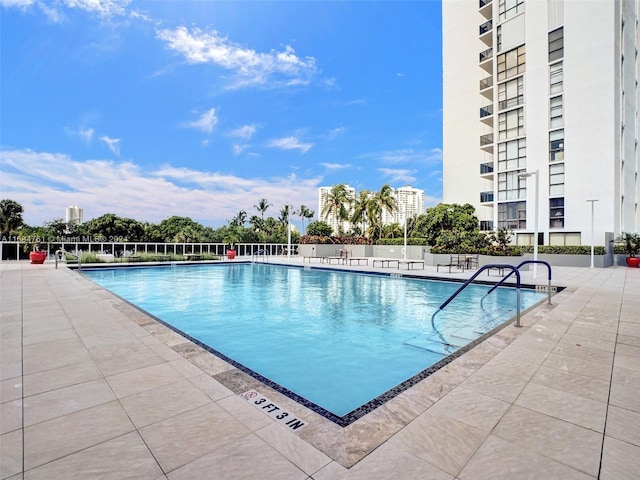 view of pool featuring a patio