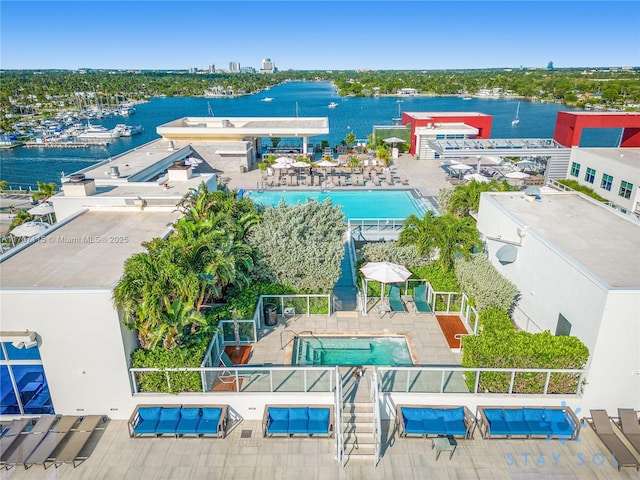 drone / aerial view featuring a water view