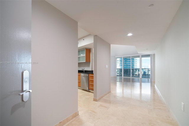 400 Alton Rd Unit 2309, Miami Beach, FL 33139 - corridor with recessed lighting and a wall of windows