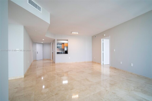 400 Alton Rd Unit 2309, Miami Beach, FL 33139 - unfurnished living room featuring recessed lighting and baseboards