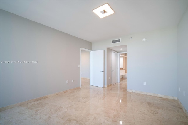 400 Alton Rd Unit 2309, Miami Beach, FL 33139 - empty room featuring light marble finish flooring and baseboards