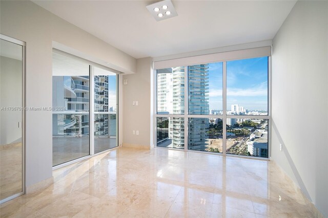 400 Alton Rd Unit 2309, Miami Beach, FL 33139 - unfurnished room featuring expansive windows and a view of city