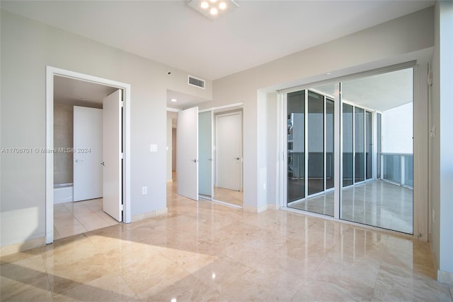 400 Alton Rd Unit 2309, Miami Beach, FL 33139 - unfurnished room featuring baseboards