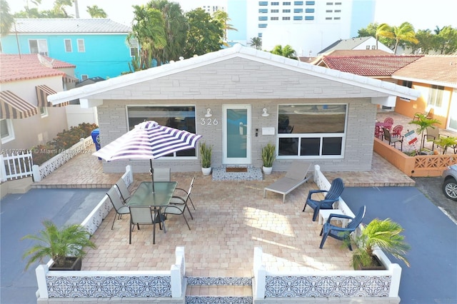 rear view of property with a patio