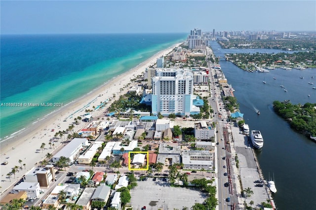 aerial view with a beach view and a water view