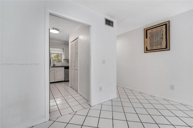 interior space with light tile patterned flooring