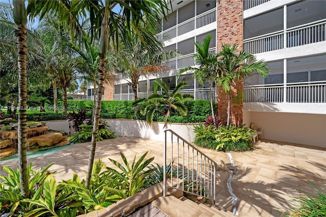 view of property's community featuring a patio