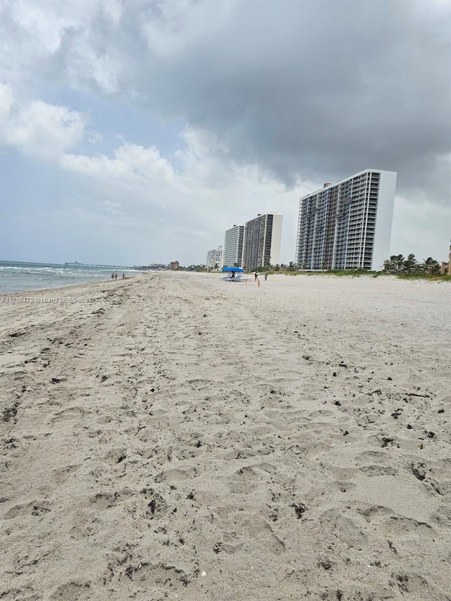 property view of water featuring a view of the beach