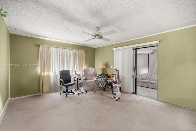 office area with light carpet, ornamental molding, and ceiling fan