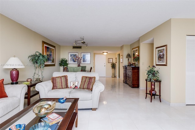 living room featuring a textured ceiling