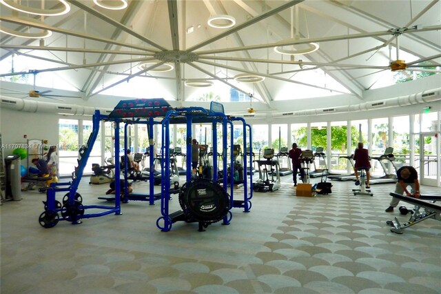 2500 Parkview Dr Unit 2315, Hallandale Beach, FL 33009 - exercise room with high vaulted ceiling and ceiling fan