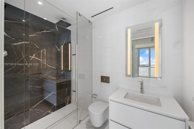 300 Biscayne Blvd Way Unit 3406, Miami, FL 33131 - bathroom featuring a marble finish shower, tile walls, toilet, vanity, and recessed lighting