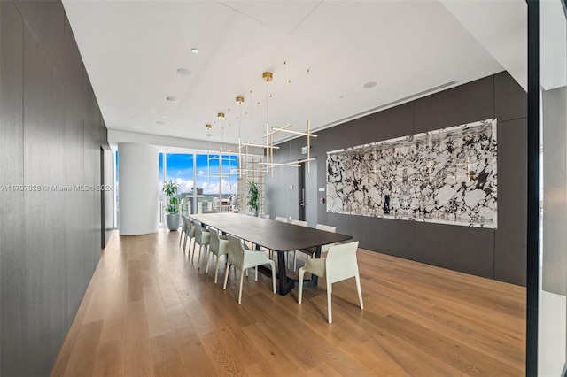 dining space featuring light hardwood / wood-style floors