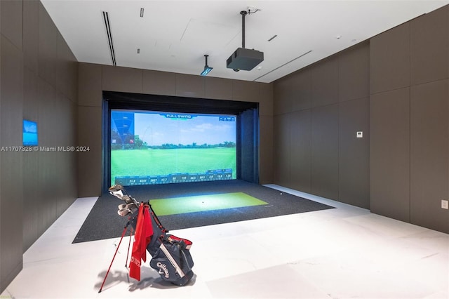 recreation room with golf simulator