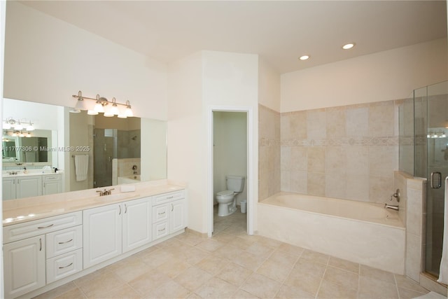 full bathroom with vanity, tile patterned floors, independent shower and bath, and toilet