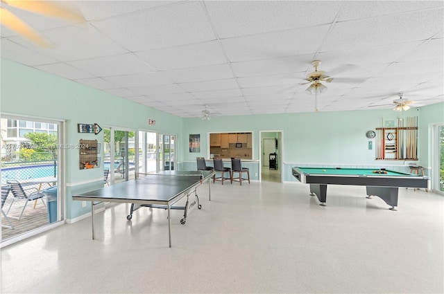 recreation room with a paneled ceiling and pool table