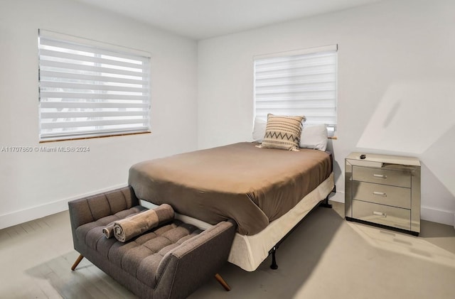 bedroom with light hardwood / wood-style flooring