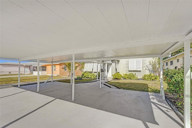 view of patio / terrace featuring a carport