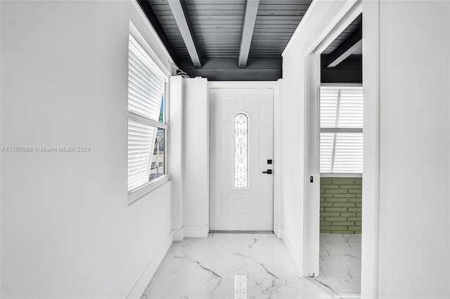 foyer with beam ceiling and wooden ceiling