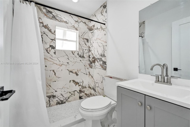 bathroom featuring vanity, toilet, and walk in shower