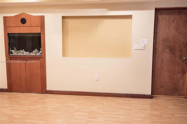 unfurnished room featuring light hardwood / wood-style floors