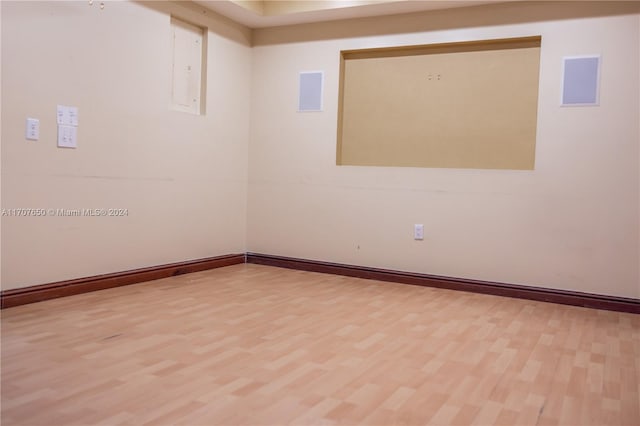 empty room with wood-type flooring