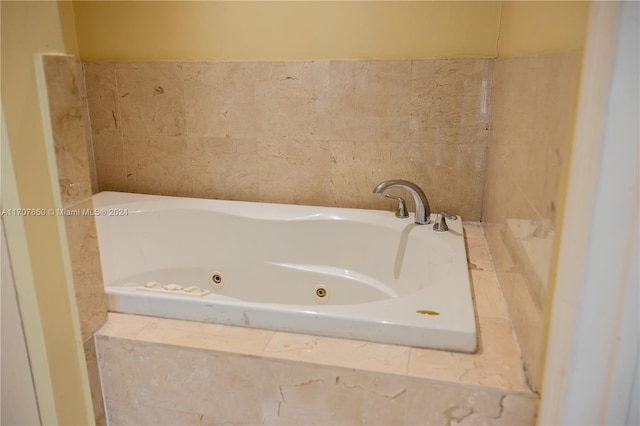 bathroom featuring tiled bath