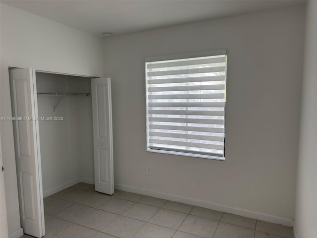 living room with light tile patterned floors