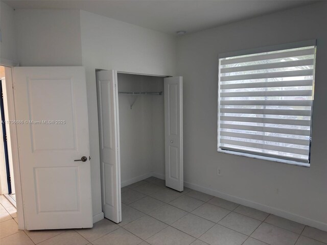 living room with light tile patterned floors