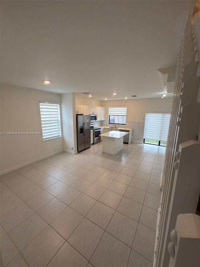 dining space with light tile patterned flooring