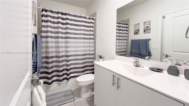 full bath with tile patterned floors, shower / bath combo with shower curtain, toilet, and vanity