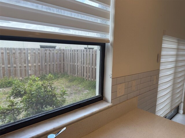 corridor with electric panel and light tile patterned flooring