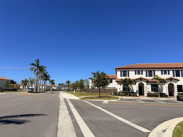 view of road featuring curbs and sidewalks