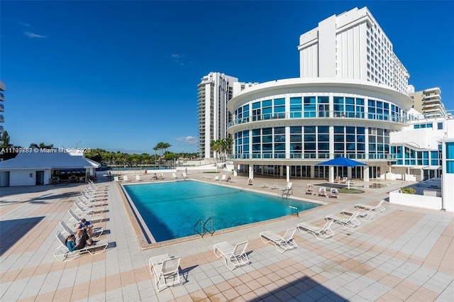 view of swimming pool featuring a patio