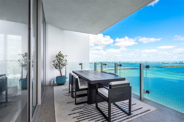 balcony featuring a water view