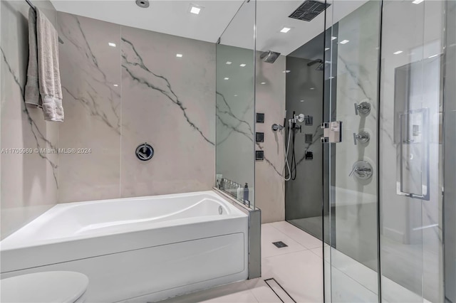 bathroom with separate shower and tub, tile patterned floors, and toilet