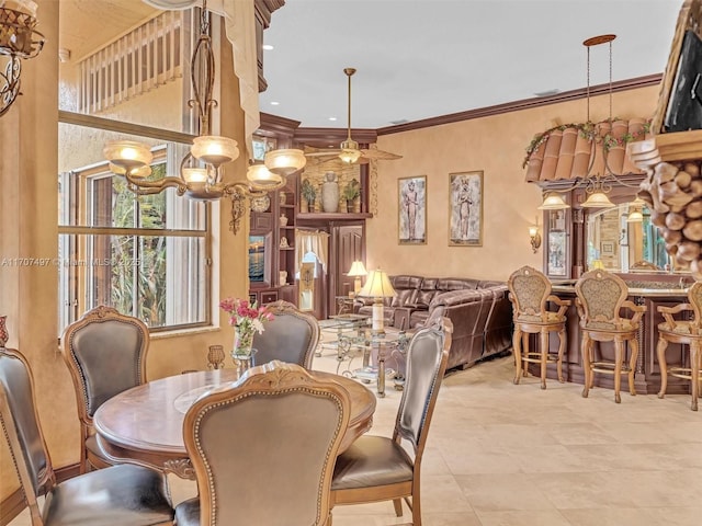 dining area featuring an inviting chandelier and ornamental molding