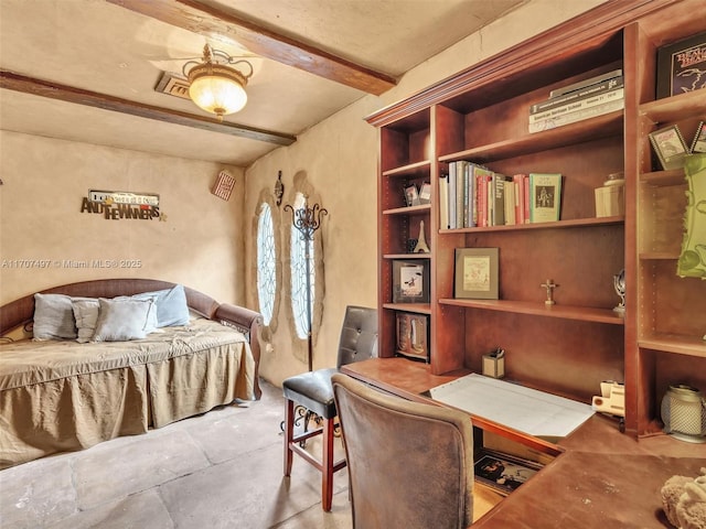 bedroom with beam ceiling