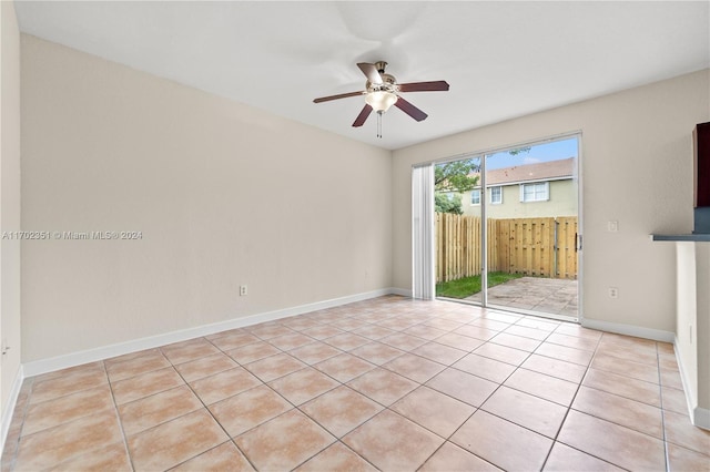 2557 SE 14th St, Homestead, FL 33035 - spare room with ceiling fan and light tile patterned floors