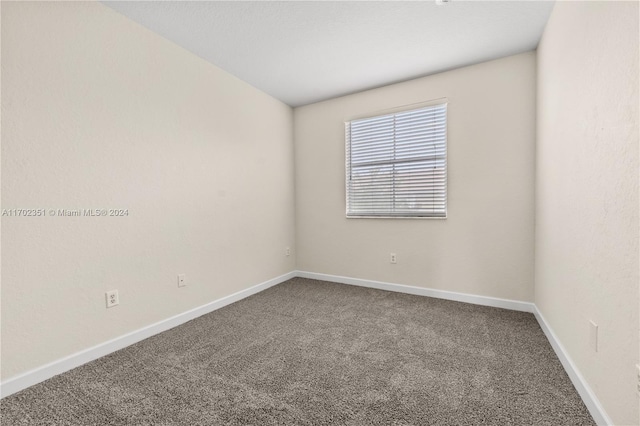 empty room with carpet floors