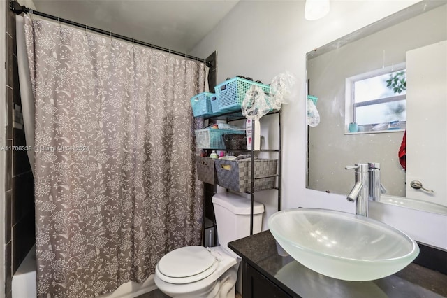 full bathroom featuring vanity, toilet, and shower / bathtub combination with curtain